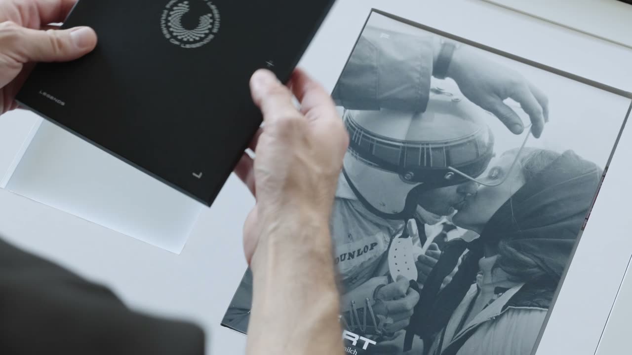 Unboxing the Framebook and hanging its prints on the wall, one by one